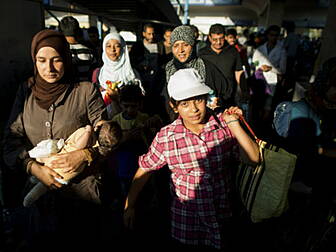 8,000 refugees have arrived in...